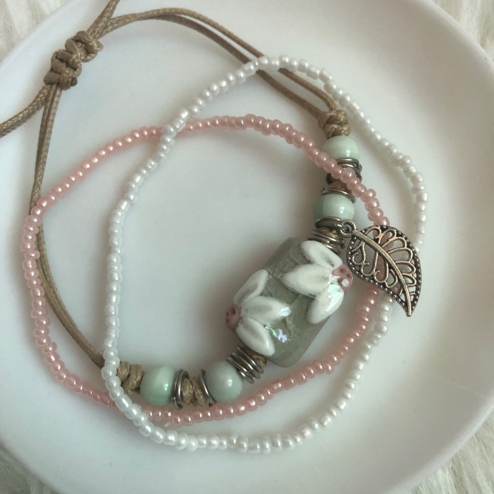 Lovely pink/white/nude tones three piece bracelets